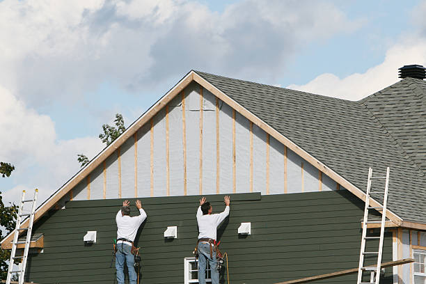 Professional Storm Damage Siding Repair technician working in Morganville, NJ